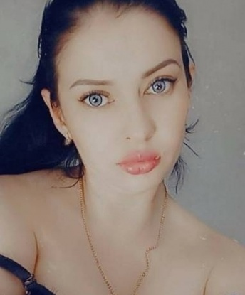 Оля